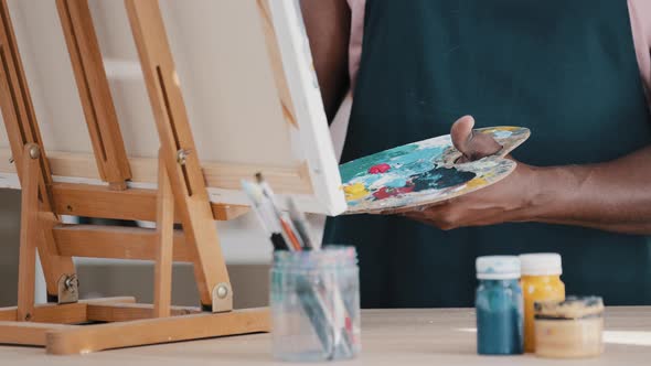 Closeup Male Hands Holding Palette Mixes Acrylic Paints Painting Picture alt