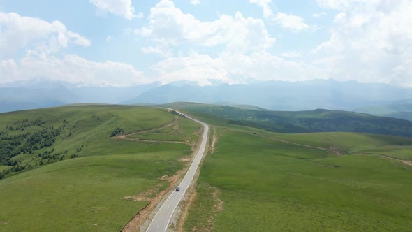 View of the Green Caucasus Mountains in Summer From the Sky alt