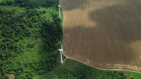 Windmills in Summer in a Green Field