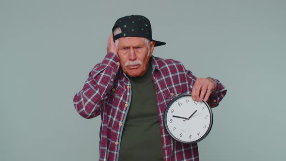 Confused Senior Man with Anxiety Checking Time on Clock Running Late to Work Being in Delay Deadline alt
