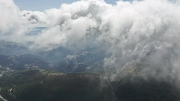 Flowing Clouds in Sky Over Mountain Range in Summer Portugal Europe alt