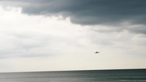 Plane is Flying Low Over the Sea