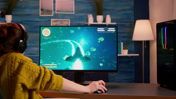 Back View of Happy Pro Gamer Winning Space Shooter Game alt