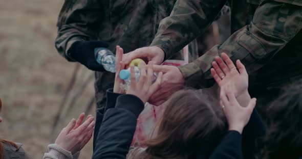 Soldiers Distributing Food And Water During War Problems alt