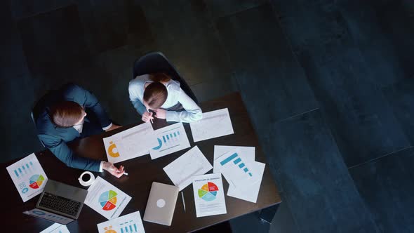 Young business people at a meeting alt
