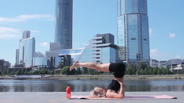 Woman working out in city