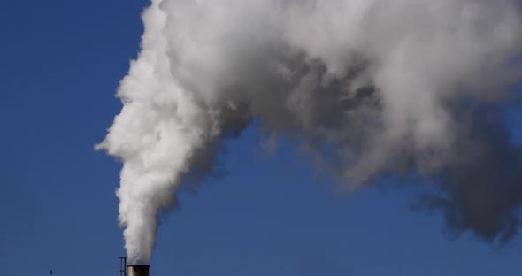 Smokestack of Sugar Refinery with Water Vapour, Near Caen in Normandy, Real Time 4K alt
