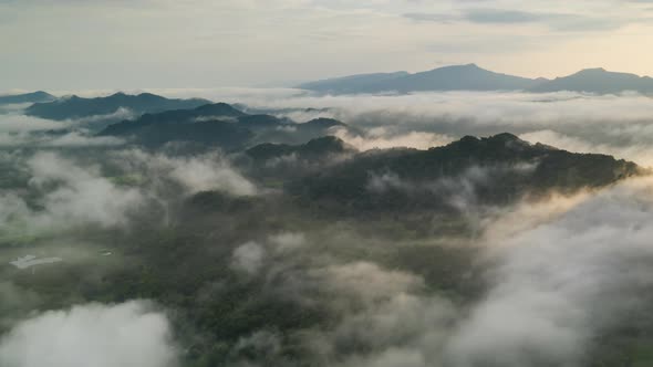 Beautiful Landscape in the morning time during sunrise with fog above the mountain, alt