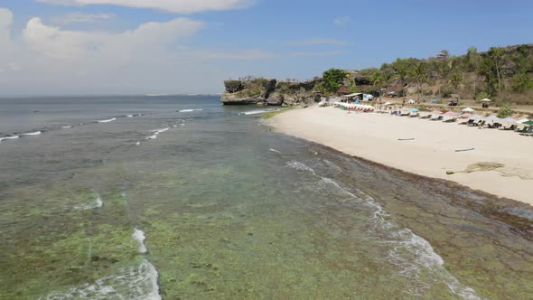 Aerial Drone Flight Over Beach at Bali Indonesia alt