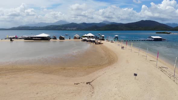 Aerial view of Tourists at the Beach alt