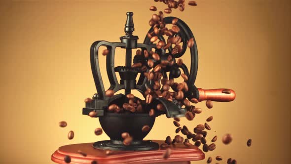 Super Slow Motion of Coffee Beans Fall on the Coffee Grinder