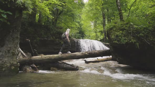 Tourist Girl With Backpack alt