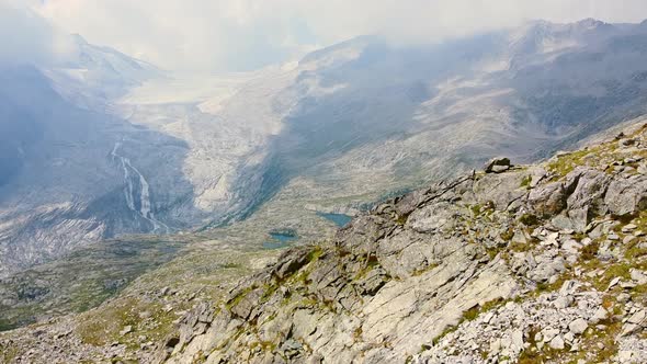 Flying over the Glacier of Adamello Mountains alt