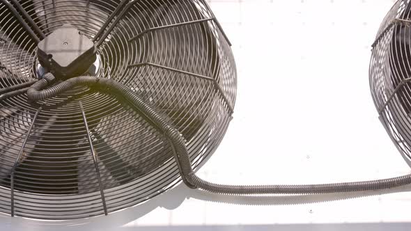 Outdoor Air Conditioner Condenser Fan Spinning Decelerating and Accelerating