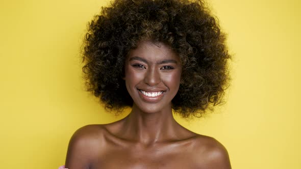 Smiling Ethnic Woman with Curly Hair
