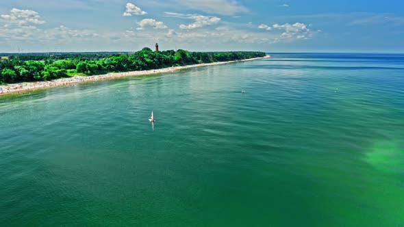 Lonely boat on Baltic Sea in summer, aerial view alt