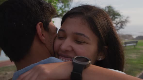 Young couple in love hugging alt