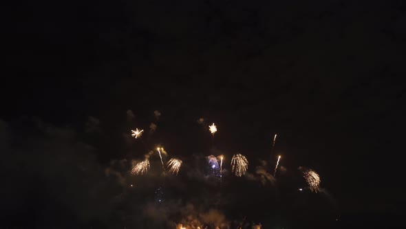 International fireworks festival display at night. Variety of colorful fireworks in holidays