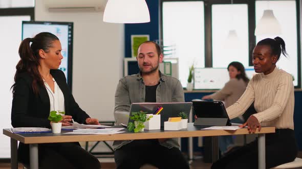 Angry Business Man Screaming at Diverse Colleagues During Office Meeting alt