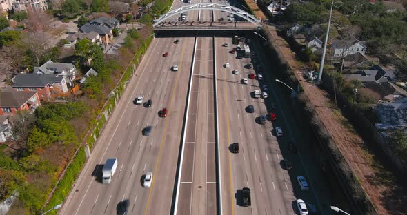 Aerial of cars on 59 South freeway in Houston, Texas on a bright sunny day alt