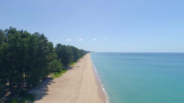 Phuket sea beautiful waves crashing on beach Aerial view alt