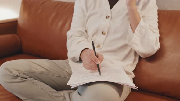 Cropped Woman Doing Paperwork alt