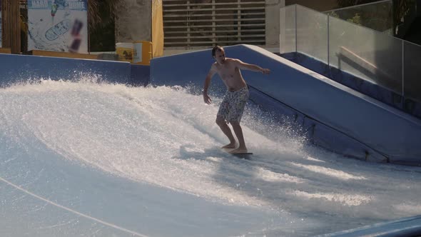 Novice Rider Learns To Ride Surf at Artifical Wave