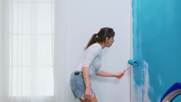 Woman Decorates Her Home alt