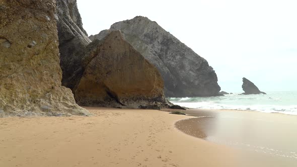 Sharp Stone Rocks on the Beach near Gruta da Adraga