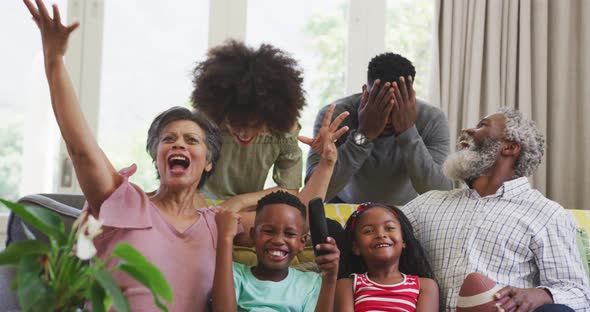 Happy family spending time together at home alt