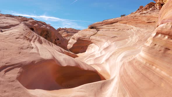 Aerial Flying Over Canyon Is Red Rock Monolith With Smooth Wavy Walls alt