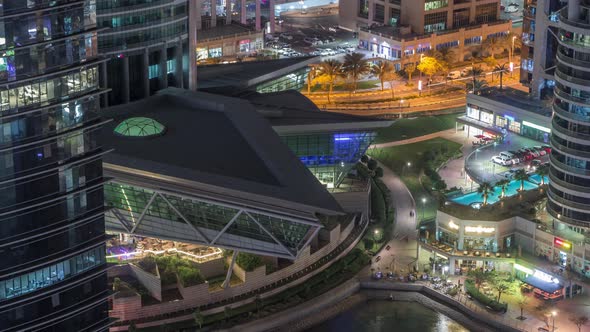 Residential and Office Buildings in Jumeirah Lake Towers District Night Timelapse in Dubai alt