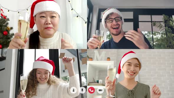 Friends wearing hat having video call raising a toast drinking and celebrating Christmas online