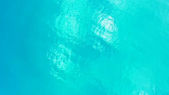 Aerial travel of marine island beach break by turquoise water and bright sandy background of a dayou alt