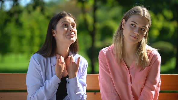 Girl Tired of Listening to Gossip and News of Annoying Friend, Envy, Selfishness alt