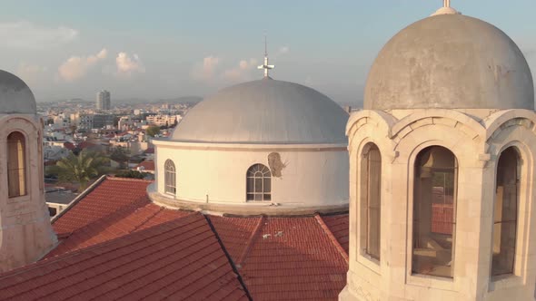 Aerial 4K Drone footage of the Church of the holy trinity at sunset in limassol, Cyprus alt