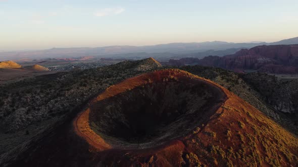 Aerial jib drone view of a dormant volcano in St. George, Utah.  Unique desert landscape. alt