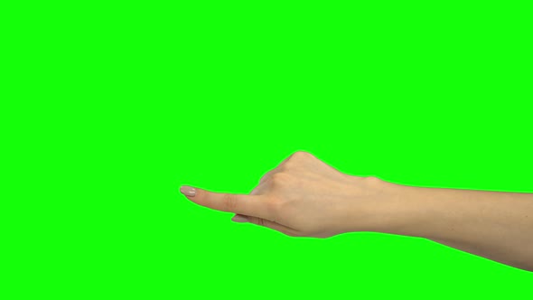 Hand of Girl Pointing at Something. Green Screen. Close Up, Stock Footage