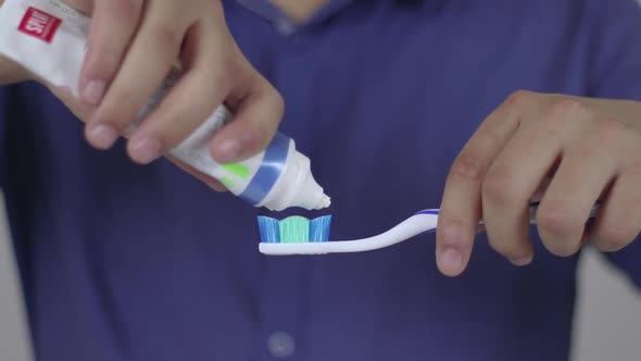 Toothpaste Dropping A Toothbrush alt