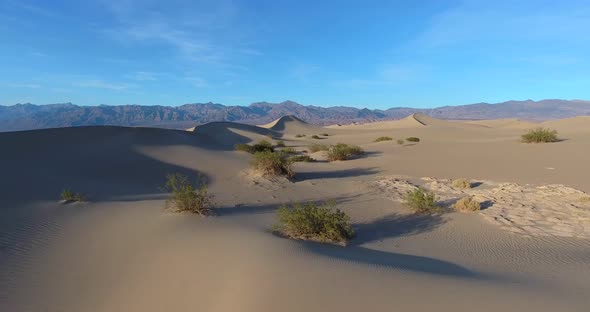 Flying toward top of Mesquite Flat Sand Dunes in Death Valley, California