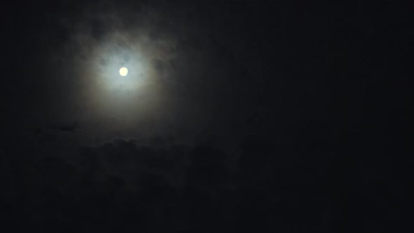 Beautiful Night Sky. Clouds and Full Moon.