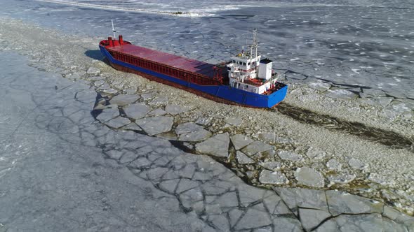 Ship Sailing in Winter Aerial View