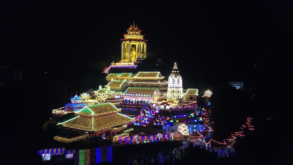 Drone shot Night view of Kek Lok Si temple with colorful beautiful light. alt