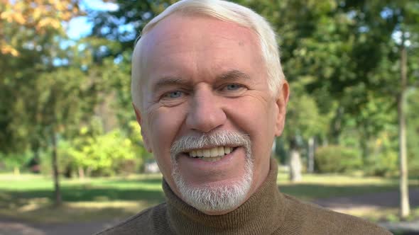 Happy Aged Male Smiling on Camera, Positive Retired Man, Dental Care, Enjoyment