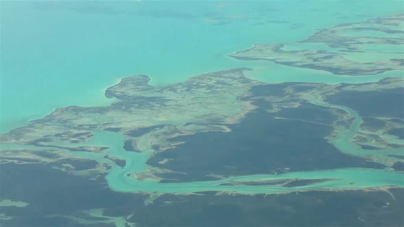 Aerial footage of isolated islands in The Bahamas. Actual high altitude footage.