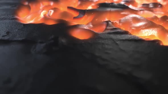 Flowing Lava On The Surface Of The Earth Raising The Soil