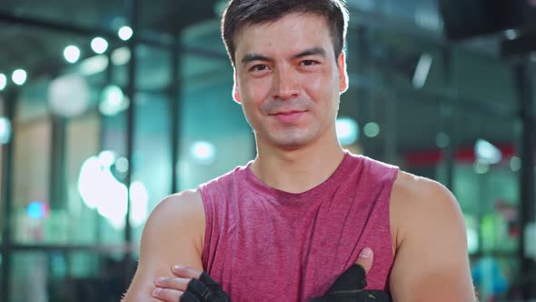 Portrait of Active Caucasian handsome Fitness sportman trainer workout exercise to build muscle. alt