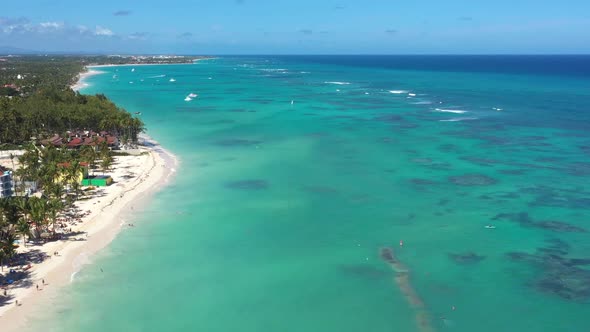 Luxury Resort on Caribbean Coastline with Palm Trees and Wooden Pier alt
