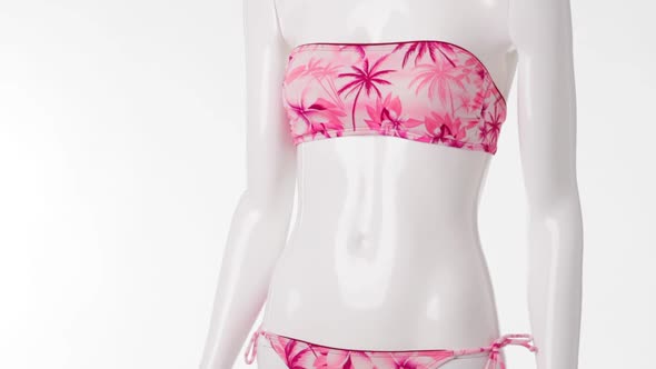 Mannequin in Pink Swimsuit. alt