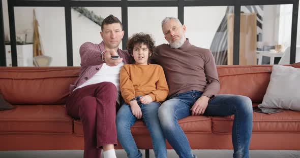 Sleepy Gay Parents and Son Watch TV Switching Channels alt
